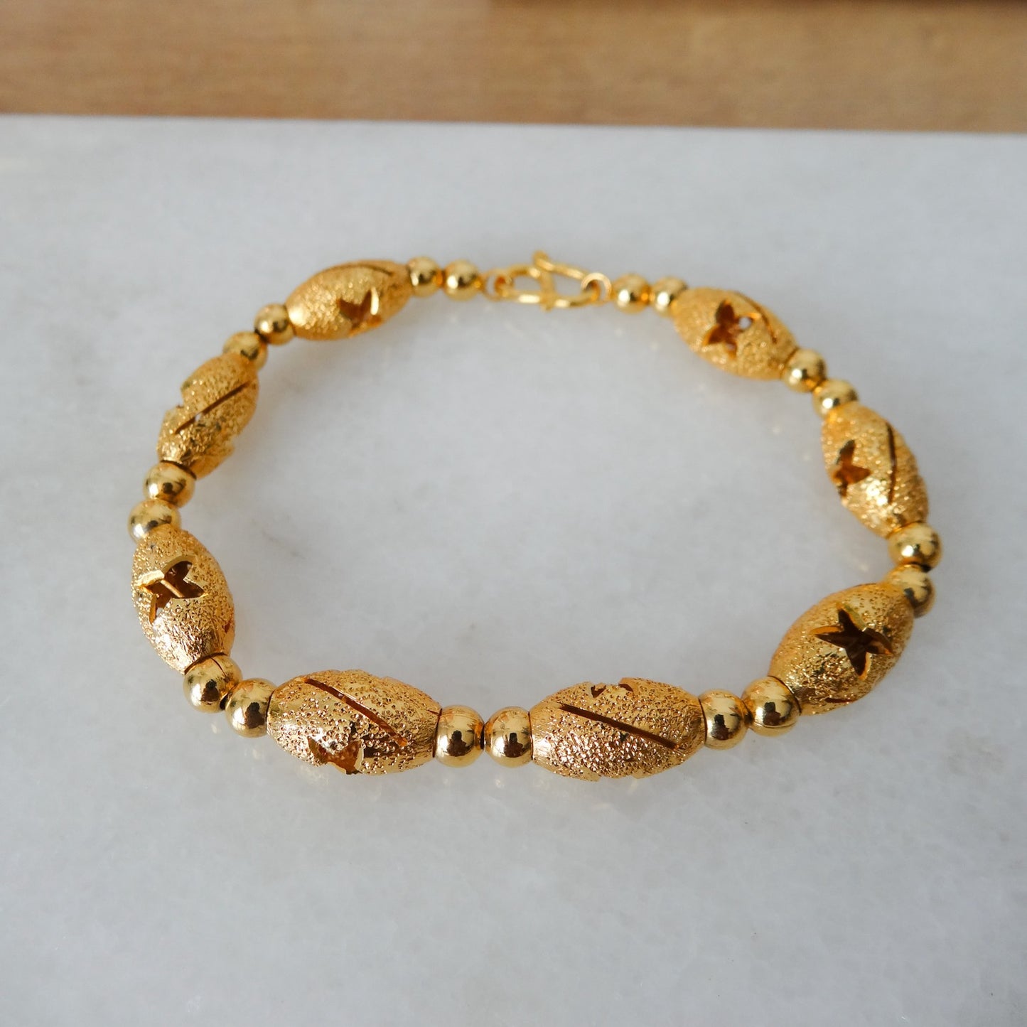 Gouden staafjes armband