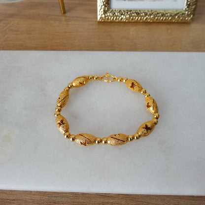 Gouden staafjes armband